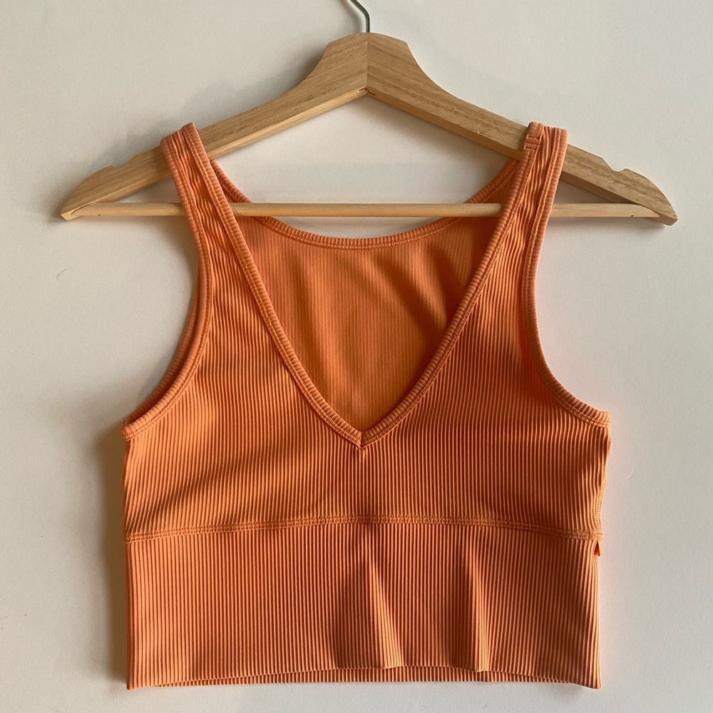 Never been worn reversible Lululemon tank. Limited addition summer color.